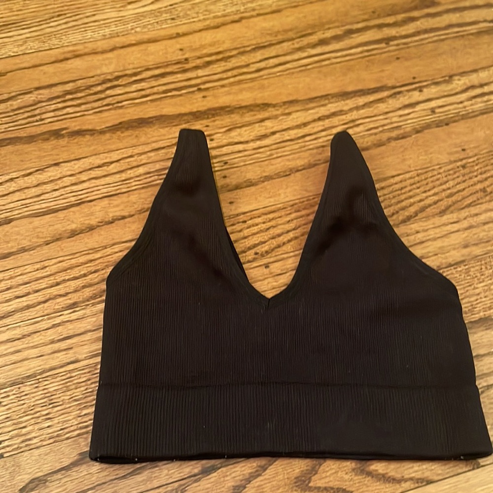 Never worn, black crop with adjustable straps from Garage!